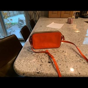 Never used.  Brand new orange Banana Republic bag. Very nice bag!